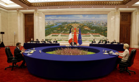 China's President Xi Jinping, center, his French counterpart Emmanuel Macron, left, and European Commission President Ursula von der Leyen meet for a working session in Beijing Thursday, April 6, 2023.