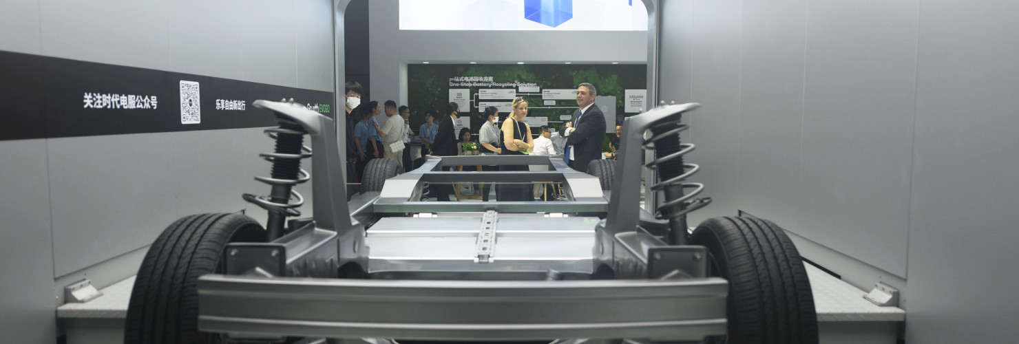 Visitors watch CATL launch its power battery automatic replacement technology at the 2023 Shanghai Auto Show in Shanghai, China.